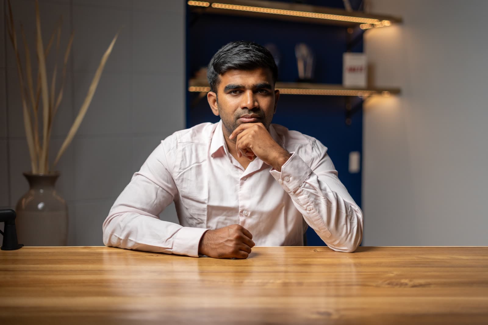 Aditya Soma at his desk in Windsor, Ontario